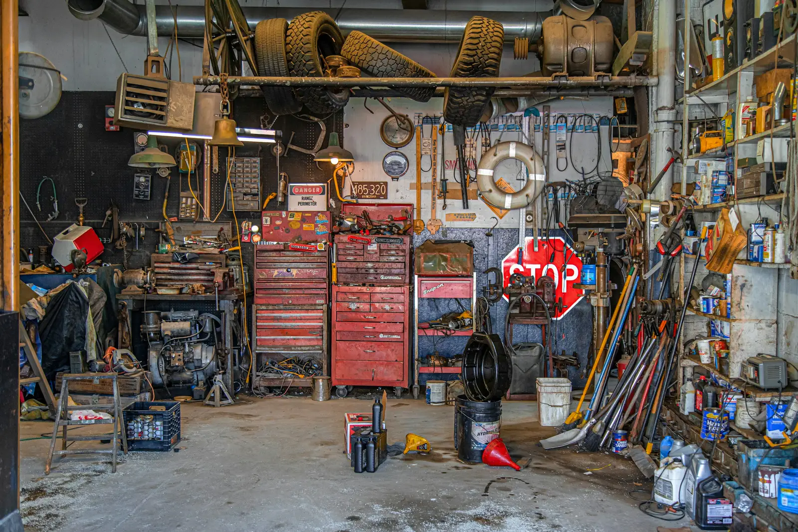 A workshop wall lined with mechanic's tools